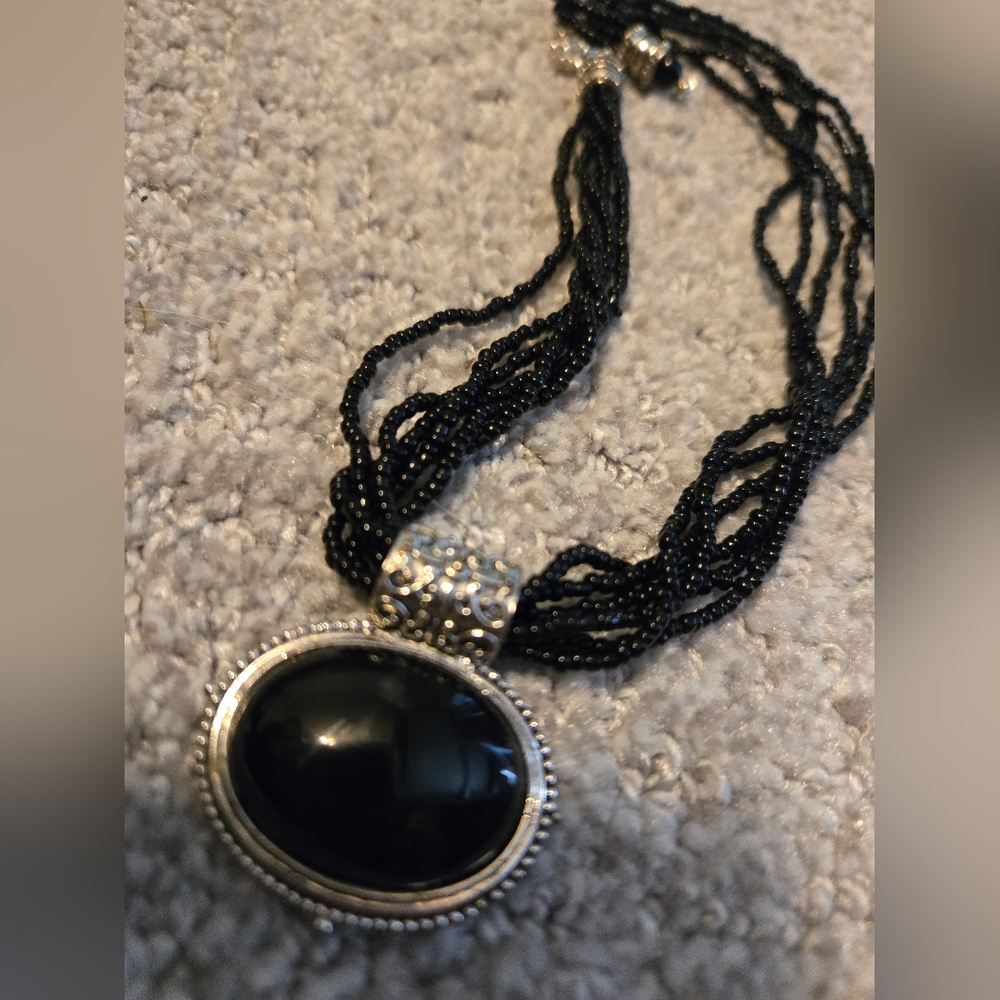 Black Beaded Necklace with Silver Pendant
